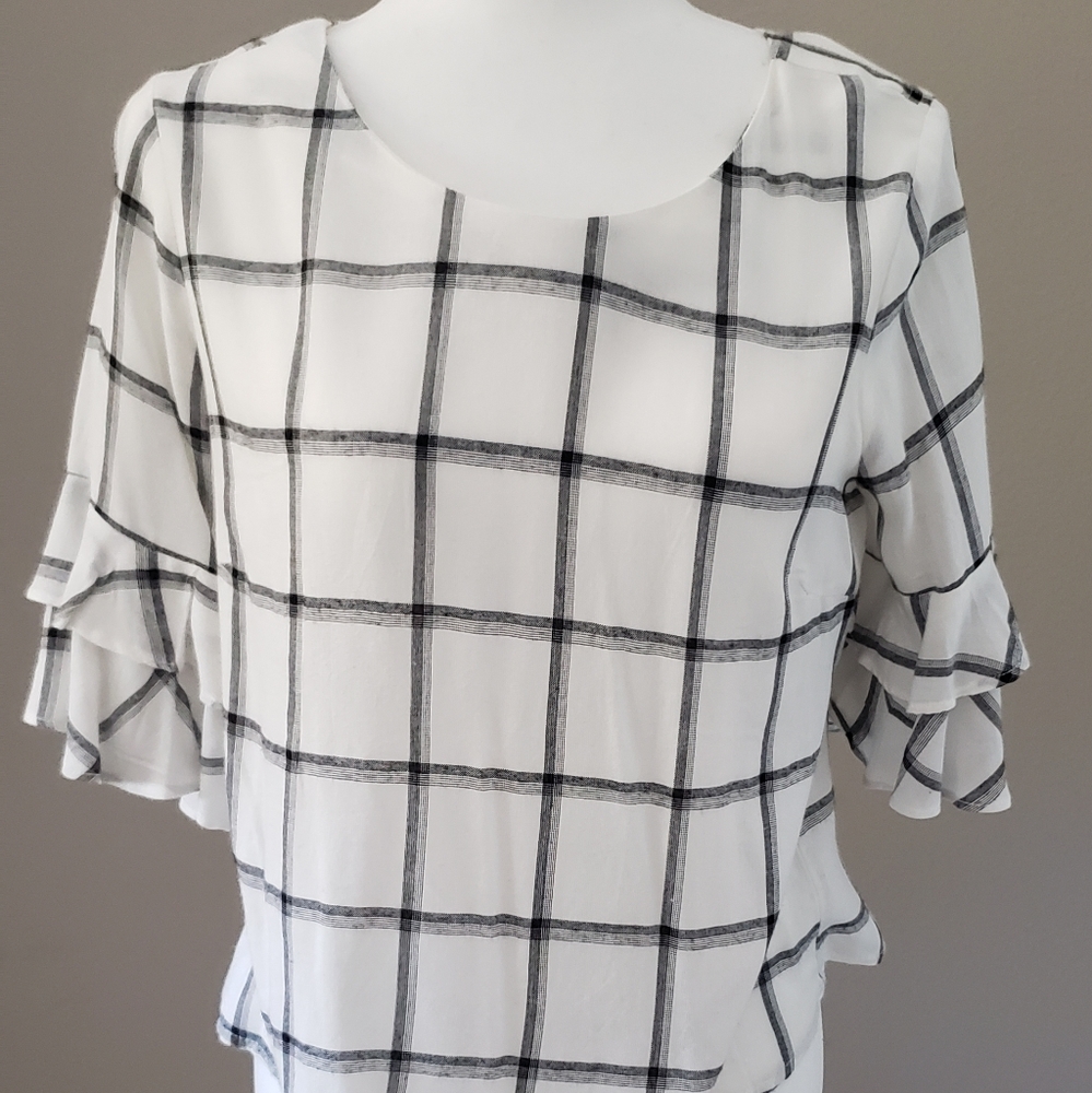 Forever 21 Ruffled Sleeve Bottom Blouse, size medium, white with black stripes.